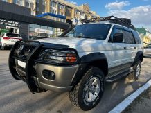 Расширители колесных арок Mitsubishi Pajero Sport (вылет 70 мм) с накладками на бампер MPS ST