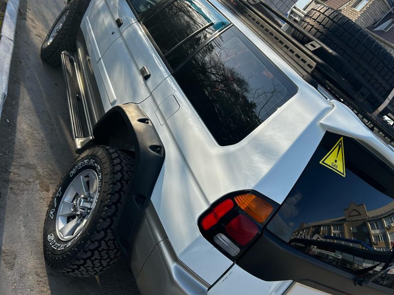 Расширители колесных арок Mitsubishi Pajero Sport (вылет 70 мм) с накладками на бампер MPS ST